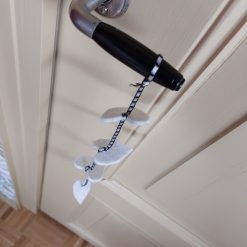 Detailfoto van zachte vilten slinger gemaakt van restmateriaal