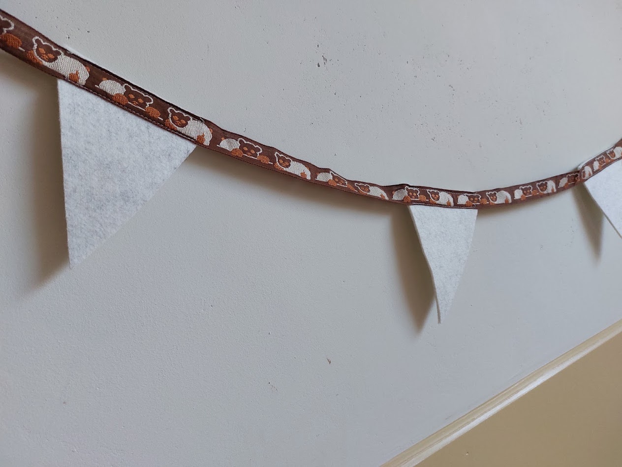 Handgemaakte vilten vlaggenlijn van gerecycled vilt voor babykamer en kinderkamer